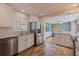 Modern kitchen featuring stainless steel appliances, granite countertops and tiled floors at 131 44Th N Ave, St Petersburg, FL 33703