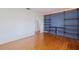 Bright living room with hardwood floors, shelving, and an open floor plan at 131 44Th N Ave, St Petersburg, FL 33703