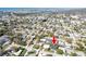 An aerial view of a neighborhood near the water, highlighting the location at 14261 113Th Ave, Largo, FL 33774