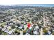 An aerial view of a neighborhood near the water and town, highlighting the location at 14261 113Th Ave, Largo, FL 33774