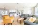 Open-concept living room, kitchen, and dining area with lots of seating and natural light at 14261 113Th Ave, Largo, FL 33774