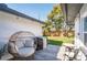 Back patio with comfortable seating and grill, perfect for outdoor entertaining and relaxation at 14261 113Th Ave, Largo, FL 33774