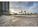 Inviting pool area with chaise lounges for relaxing and enjoying the sun at 1480 Gulf Blvd # 905, Clearwater Beach, FL 33767