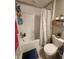 Bathroom with shower and toilet at 16725 Delia St, Wimauma, FL 33598