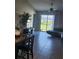 View of the living room and water from the Dining area at 16725 Delia St, Wimauma, FL 33598