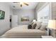 Comfortable bedroom featuring neutral paint, carpet and a ceiling fan with ample natural light at 1767 Tonka Ter, Wesley Chapel, FL 33543