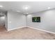 Spacious bedroom featuring plush carpeting, recessed lighting, and a mounted television at 1767 Tonka Ter, Wesley Chapel, FL 33543