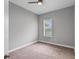 Cozy bedroom with neutral carpet and one window providing plenty of natural light at 1767 Tonka Ter, Wesley Chapel, FL 33543