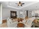 Spacious living room featuring modern decor and seamless open floor plan, perfect for entertaining and relaxing at 1767 Tonka Ter, Wesley Chapel, FL 33543