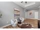 Living room featuring hardwood floors and neutral color scheme and contemporary decor at 1767 Tonka Ter, Wesley Chapel, FL 33543