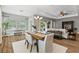 Inviting living room with wood floors and ample natural light, ideal for Gathering gatherings and entertaining at 1767 Tonka Ter, Wesley Chapel, FL 33543