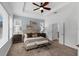 Serene bedroom featuring a trey ceiling, and a peaceful ambiance for relaxation and rest at 1767 Tonka Ter, Wesley Chapel, FL 33543