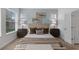Bright main bedroom with an accent wall, and comfortable furnishings for a restful retreat at 1767 Tonka Ter, Wesley Chapel, FL 33543