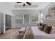 Spacious main bedroom boasting ample windows and cozy decor, creating a tranquil personal oasis at 1767 Tonka Ter, Wesley Chapel, FL 33543