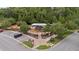 Aerial view of community playground with slides and play equipment and easy parking at 1767 Tonka Ter, Wesley Chapel, FL 33543