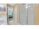 Hall bathroom featuring dual sinks and a shower, convenient to the bright main bedroom at 18148 Nassau Point Dr, Tampa, FL 33647