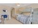 Bright bedroom featuring an ample amount of closet space, a desk, and a bunk bed at 18148 Nassau Point Dr, Tampa, FL 33647