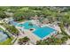 Bird's eye view of community amenities, including a pool, waterslides, and tennis courts at 18148 Nassau Point Dr, Tampa, FL 33647
