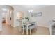 Dining area with a bench seat and an archway to the kitchen at 18148 Nassau Point Dr, Tampa, FL 33647