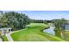 Scenic golf course view with manicured greens and serene water features at 18148 Nassau Point Dr, Tampa, FL 33647