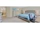 Bright main bedroom featuring an ample amount of closet space and en-suite bathroom with neutral colors at 18148 Nassau Point Dr, Tampa, FL 33647