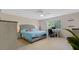 Bright main bedroom featuring an ample amount of closet space and en-suite bathroom with neutral colors at 18148 Nassau Point Dr, Tampa, FL 33647