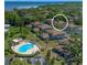 Enjoy community living with a pool, mature landscaping, and water views from this condo development at 1833 Bough Ave # 2, Clearwater, FL 33760