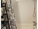 The white subway tile gives this shower a bright, fresh look at 1833 Bough Ave # 2, Clearwater, FL 33760