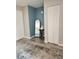 Bright bedroom features a full length mirror and plenty of natural light at 1833 Bough Ave # 2, Clearwater, FL 33760