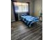 Cozy bedroom features plenty of natural light and minimalist decor at 1833 Bough Ave # 2, Clearwater, FL 33760