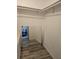 Walk in closet features an organizational system at 1833 Bough Ave # 2, Clearwater, FL 33760