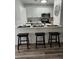 Bright kitchen with stainless steel appliances, modern countertops, and stylish decor at 1833 Bough Ave # 2, Clearwater, FL 33760