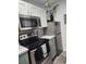 Modern kitchen with stainless steel appliances, stylish cabinetry, and contemporary design at 1833 Bough Ave # 2, Clearwater, FL 33760