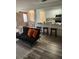 Bright living area featuring an open floor plan to the dining and kitchen areas at 1833 Bough Ave # 2, Clearwater, FL 33760