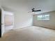 Large bedroom with ceiling fan and natural light at 1921 Ridgewood Dr, Clearwater, FL 33763