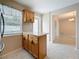 The kitchen features a center island with cabinets and quartz countertop at 1921 Ridgewood Dr, Clearwater, FL 33763