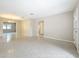 Expansive living room featuring beautiful terrazzo floors and a flowing layout at 1921 Ridgewood Dr, Clearwater, FL 33763