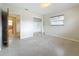 Spacious main bedroom with neutral tones, ample closet space, and an en-suite bathroom at 1921 Ridgewood Dr, Clearwater, FL 33763