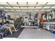 Organized garage with ample storage, washer, dryer and space for parking and projects at 1960 Sever Dr, Clearwater, FL 33764