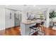 Modern kitchen with stainless steel appliances and granite countertops, plus an island and seating at 1960 Sever Dr, Clearwater, FL 33764