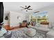 Comfortable living room with soft lighting, plush seating, and neutral tones at 1960 Sever Dr, Clearwater, FL 33764