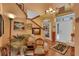 Inviting foyer showcases hardwood floors, staircase, decor, and floods of natural light creating a warm and welcoming entrance at 2015 Long Branch Ln, Clearwater, FL 33760