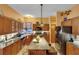 Well-equipped kitchen featuring granite countertops, stainless steel appliances, and ample cabinetry at 2015 Long Branch Ln, Clearwater, FL 33760