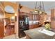 Open kitchen featuring granite countertops, stainless steel appliances, and views to the dining room at 2015 Long Branch Ln, Clearwater, FL 33760