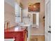 Convenient laundry room with appliances, folding station and storage at 2015 Long Branch Ln, Clearwater, FL 33760