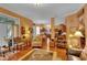 Inviting living room with hardwood floors, and warm, neutral-toned walls at 2015 Long Branch Ln, Clearwater, FL 33760
