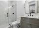 Contemporary bathroom with tiled shower and dark fixtures at 2101 3Rd N Ave, St Petersburg, FL 33713