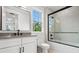 This bathroom has a glass shower and a large white vanity at 2101 3Rd N Ave, St Petersburg, FL 33713