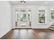 Bright living room with hardwood floors and a glass door leading to the outside at 2101 3Rd N Ave, St Petersburg, FL 33713