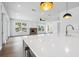 Open living space featuring a fireplace and views of the surrounding landscape at 2101 3Rd N Ave, St Petersburg, FL 33713